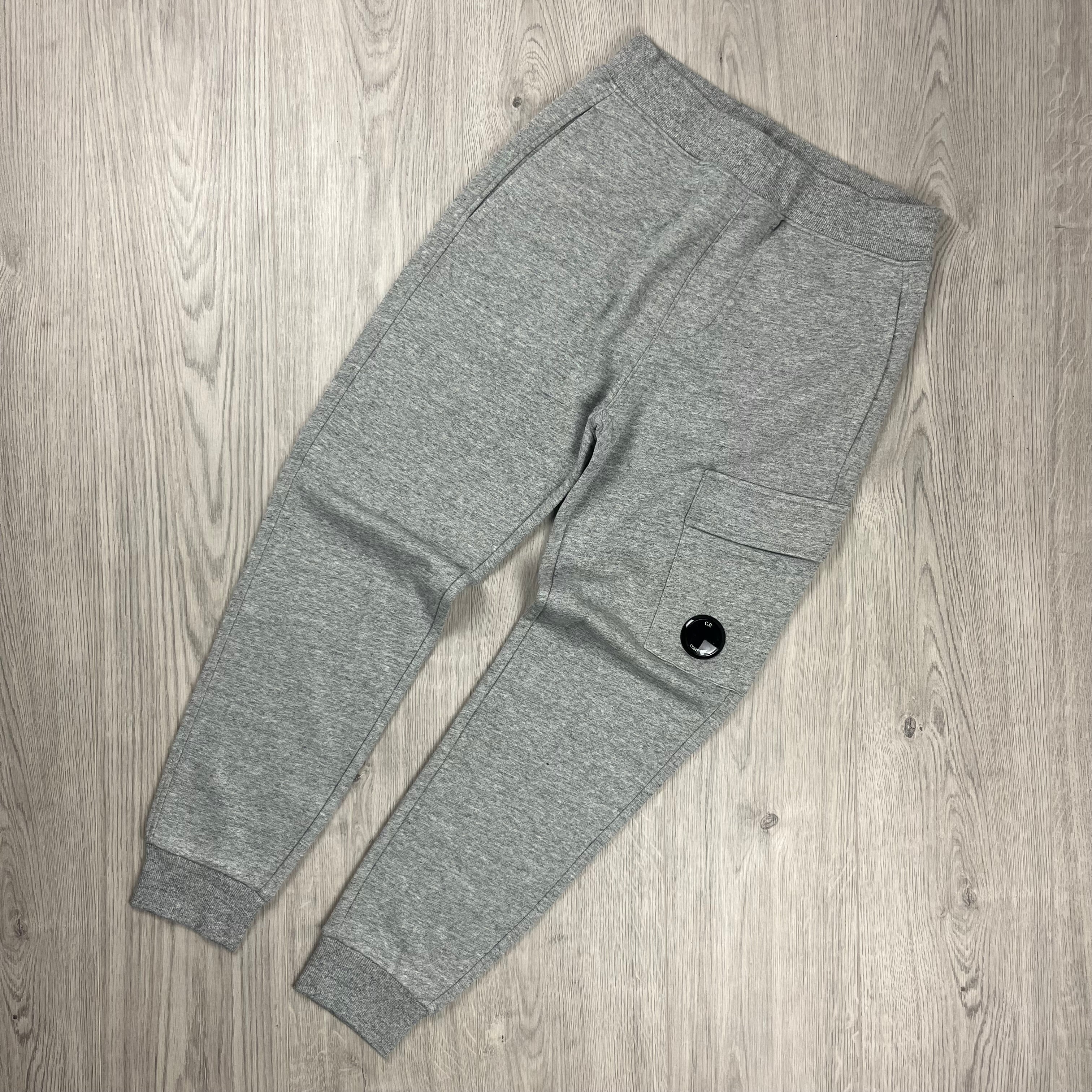 CP Company tracksuit in Greystone Melange. On sale at Open Attire.