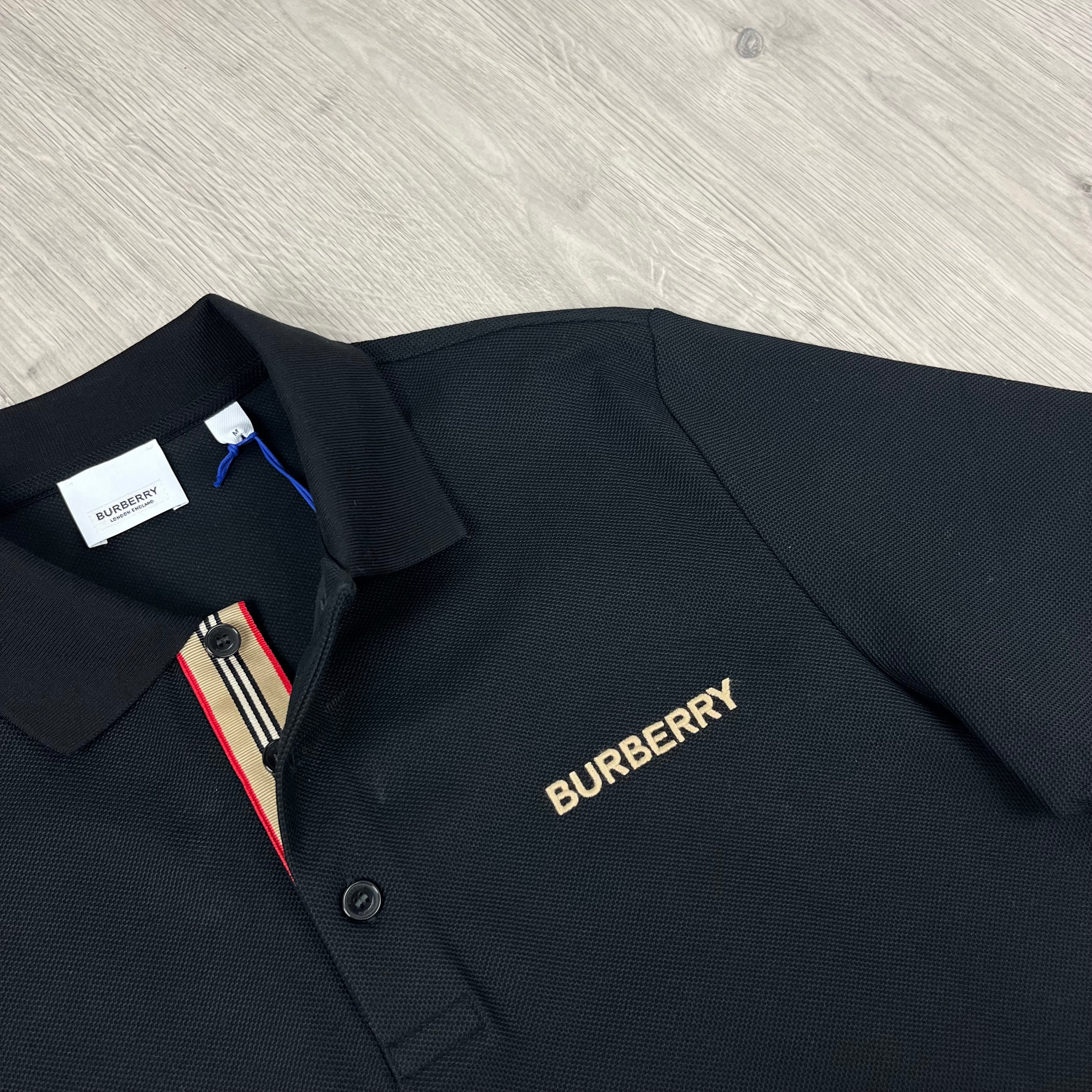 Men's Burberry 'Hartford' Polo Shirt in Black. On sale at Open Attire.