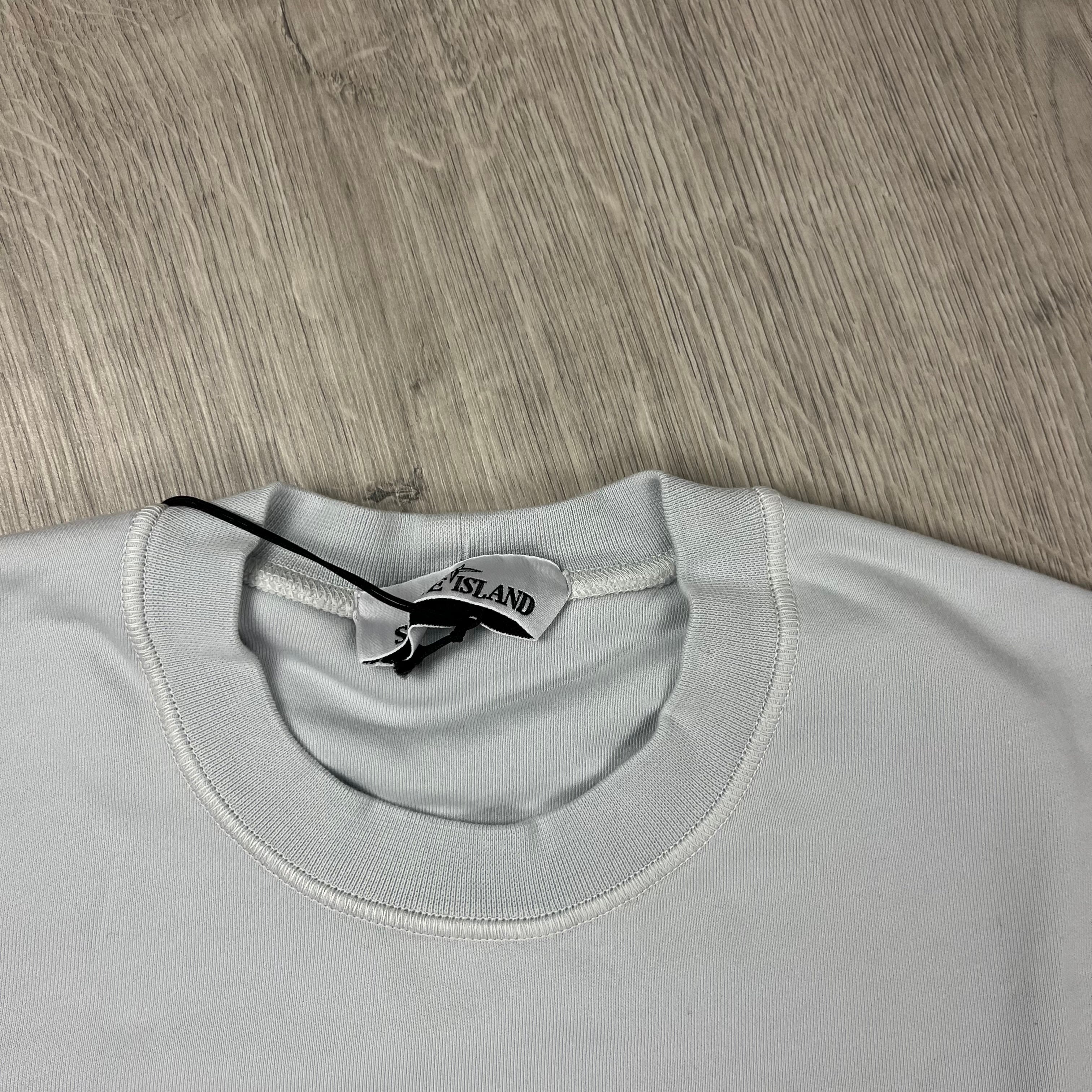 Stone Island Dyed Cotton Sweatshirt in Sky Blue. On sale at Open Attire.