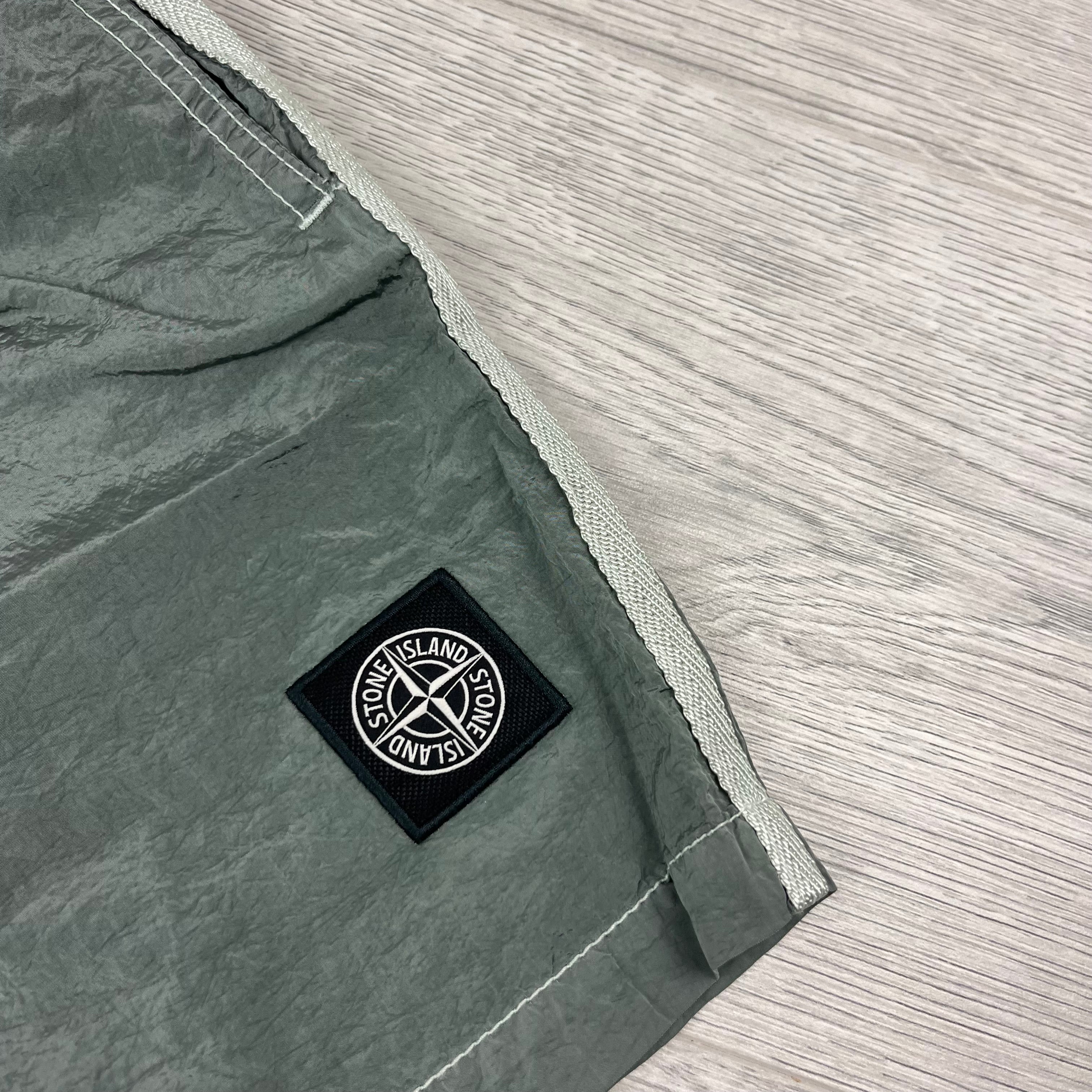 Stone Island Nylon Metal Swim Shorts in Sage Green. On sale at Open Attire.