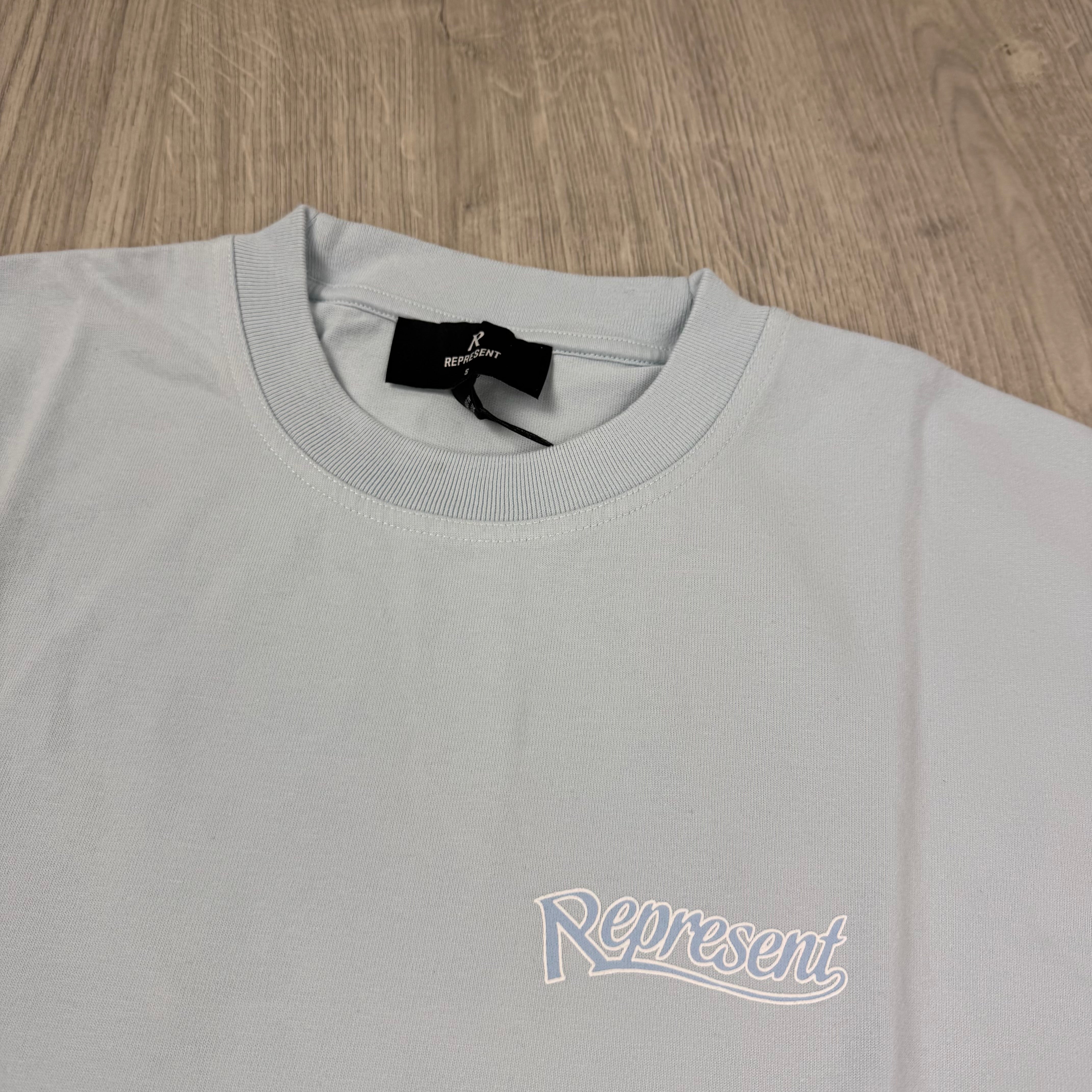 Represent 'Showcasing' T-Shirt - Cloud