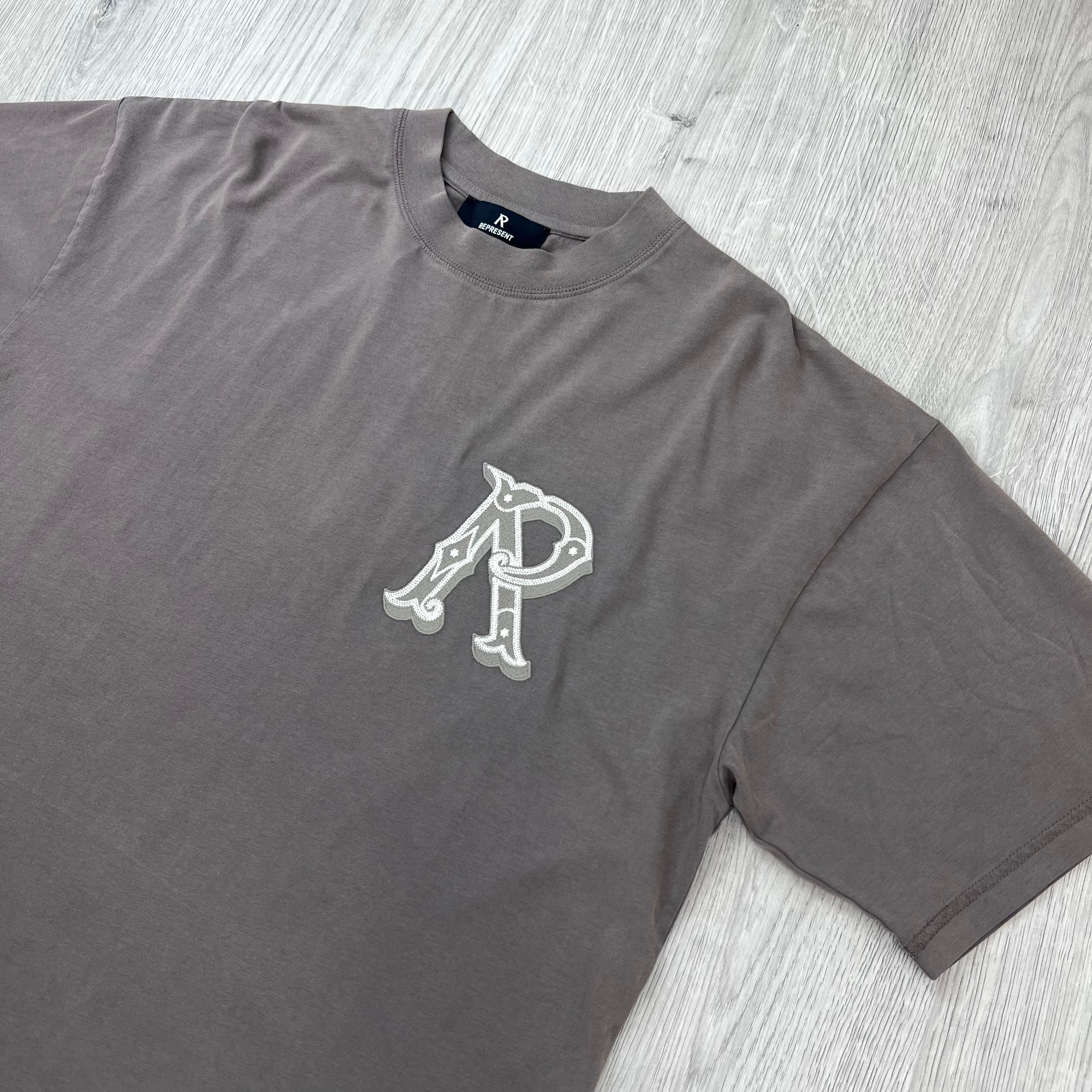 Represent 'Western Initials' T-Shirt in Flat White - Angled view.