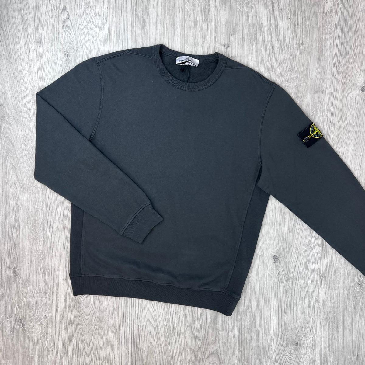 Front view of the Stone Island Crewneck Brushed Cotton Sweatshirt in Lead Grey.