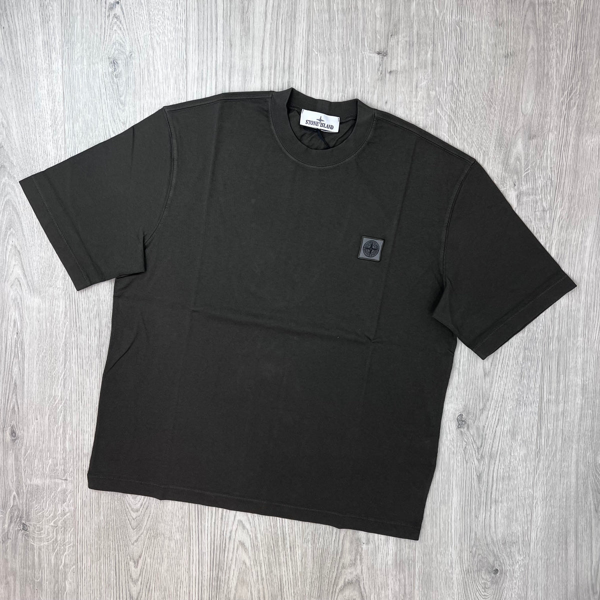 Front view of a Stone Island Combed Organic Patch T-Shirt in Coal Grey. 
