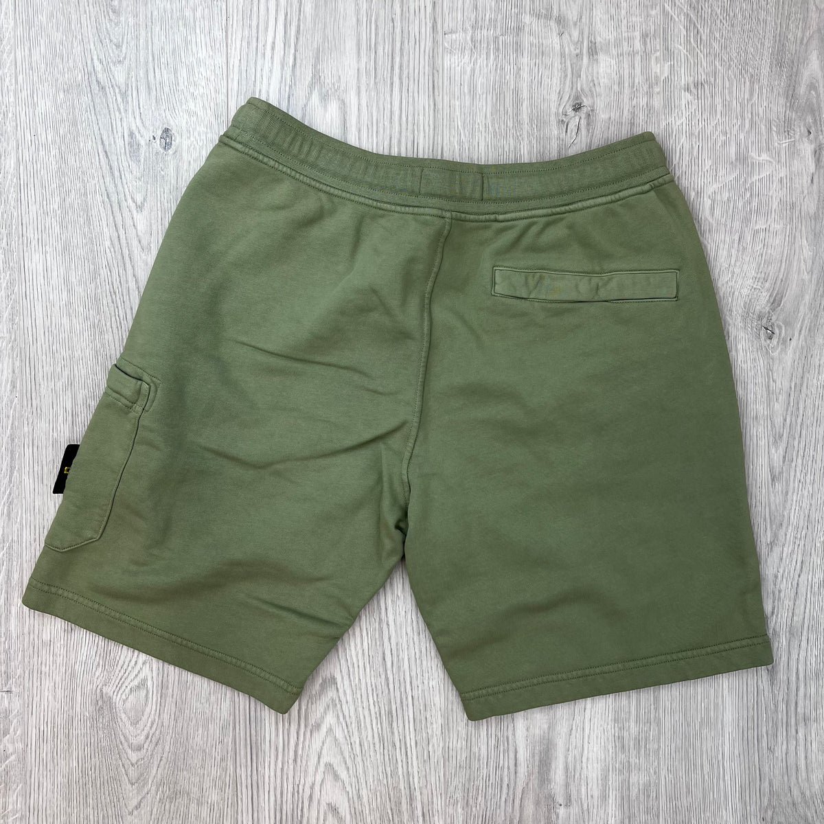 Rear view of the Stone Island Jersey Shorts in Laurel Green. 